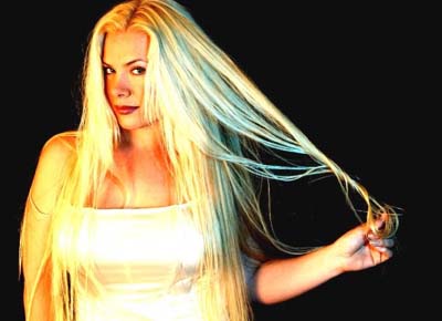 Amanda Somerville with blonde hair promo photo