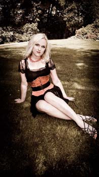 Liv Kristine dress and shoes outside