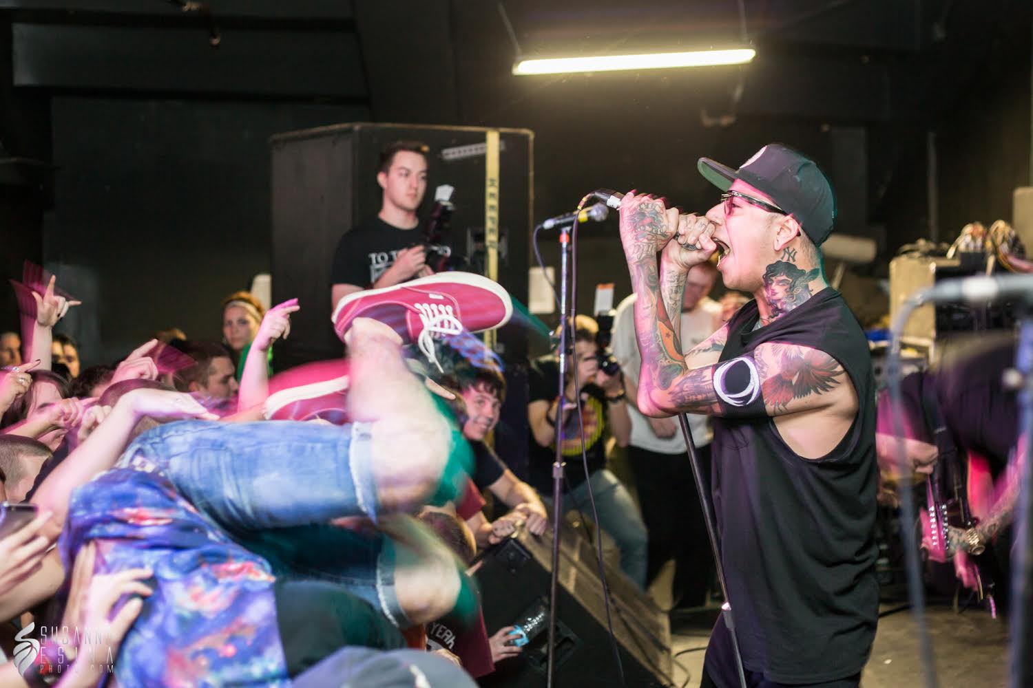 crowd surfing with singer singing