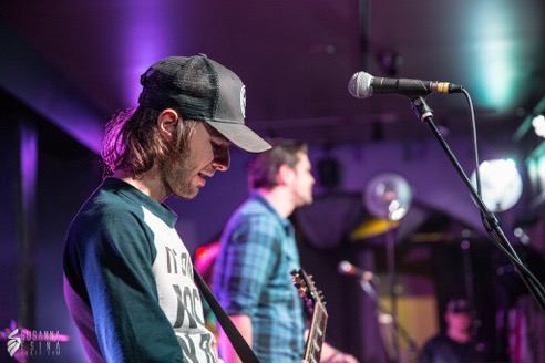 Adelitas Way guitarist baseball cap