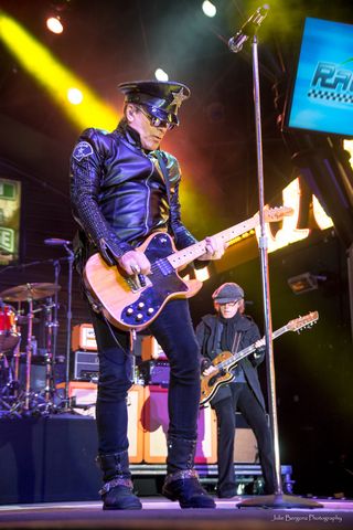 cheap trick singer in leather